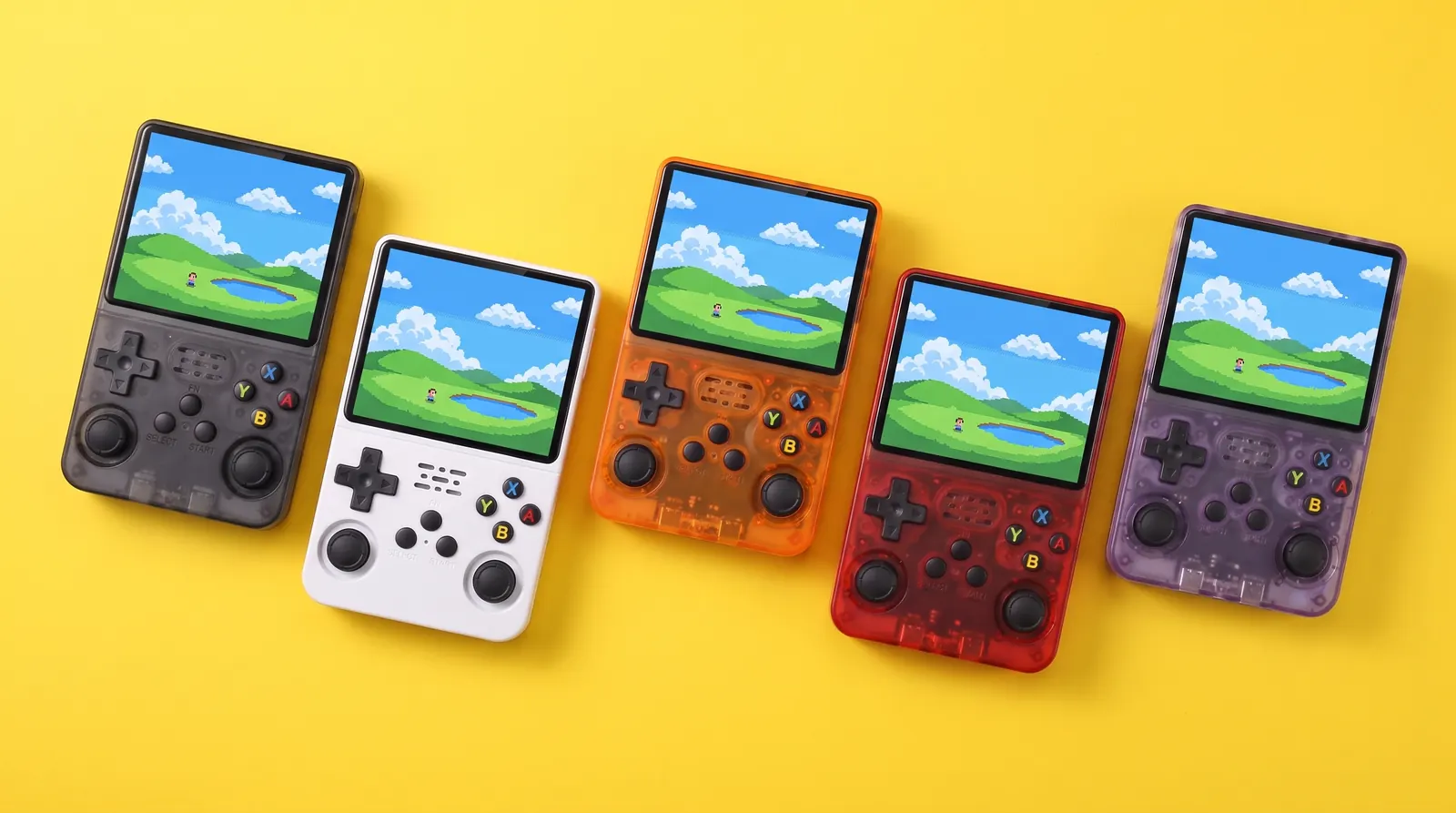 Five R36S consoles lying flat on a yellow background: black, white, orange, red and purple